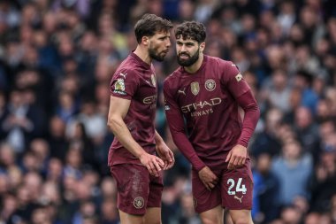 Manchester City 'den Rben Dias, Premier League maçı sırasında Manchester City' den Joko Gvardiol ile Goodison Park, Liverpool, Birleşik Krallık 'ta 19 Nisan 2025 tarihinde oynanan karşılaşmada konuştu.