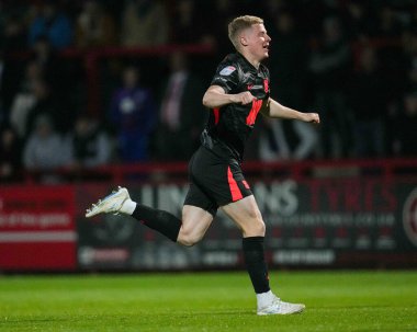 Birmingham City 'den Alex Cochrane 24 Nisan 2025' te İngiltere 'nin Stevenage Stevenage şehrinde oynanan Sky Bet 1 karşılaşmasında golü kutluyor.