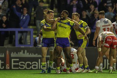 Warrington Wolves 'tan Rodrick Tai, 24 Nisan 2025' te İngiltere 'nin Warrington kentinde oynanan 9. Betfred Süper Lig karşılaşmasında Warrington Wolves St. Helens' e karşı oynadığı maçı kutluyor.