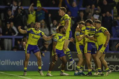 Warrington Wolves 'tan Rodrick Tai, 24 Nisan 2025' te İngiltere 'nin Warrington kentinde oynanan 9. Betfred Süper Lig karşılaşmasında Warrington Wolves St. Helens' e karşı oynadığı maçı kutluyor.