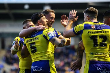 Warrington Wolves 'tan Matty Ashton, 24 Nisan 2025' te İngiltere 'nin Halliwell Jones Stadyumu' nda oynanan 9. Warrington Wolves-St Helens maçında 8-0 'lık Betfred Süper Ligi karşılaşmasını kutluyor.