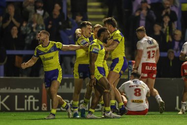 Warrington Wolves 'tan Rodrick Tai, 24 Nisan 2025' te İngiltere 'nin Warrington kentinde oynanan 9. Betfred Süper Lig karşılaşmasında Warrington Wolves St. Helens' e karşı oynadığı maçı kutluyor.