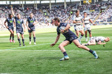 Wigan Warriors 'dan Jai Field, 27 Nisan 2025' te MKM Stadyumu 'nda oynanan 9. Betfred Süper Lig karşılaşmasında bir deneme için sahaya çıkıyor.