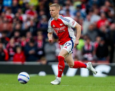 Arsenal 'den Oleksandr Zinchenko, 3 Mayıs 2025' te Emirates Stadyumu 'nda oynanan Premier League maçında topla koşuyor.