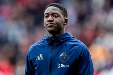 Manchester United takımından Kobbie Mainoo, Premier League maçından önce Londra 'daki The Gtech Community Stadyumu' nda Brentford-Manchester United maçında sıralanır.