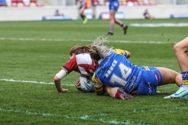 Wigan Warriors takımından Grace Banks, 10 Mayıs 2025 'te İngiltere' nin LNER Community Stadyumu 'nda oynanan Betfred Kadınlar Meydan Okuma Kupası yarı final karşılaşmasında Wigan Warriors' a karşı oynuyor.