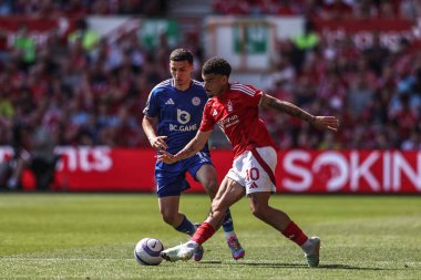 Nottingham Ormanı 'ndan Bilal El Khannouss ve Nottingham Ormanı' ndan Morgan Gibbs-White Premier Lig maçı sırasında Nottingham Ormanı 'na karşı Leicester City, Nottingham, İngiltere' de 11 Mayıs 2025 'te karşı karşıya geldiler.