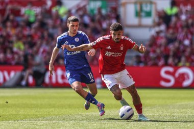 Nottingham Ormanı 'ndan Chris Wood ve Nottingham Ormanı' ndan Morgan Gibbs-White Premier Lig maçı sırasında Nottingham Forest 'a karşı Leicester City City, Nottingham, İngiltere' de 11 Mayıs 2025 'te oynadılar.