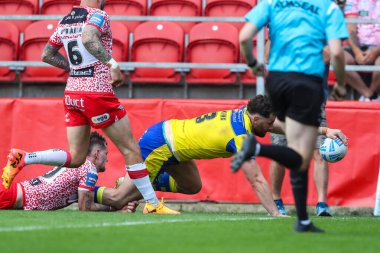 Warrington Kurtları 'ndan Toby King, 11 Mayıs 2025' te İngiltere 'nin St. Helens kentinde oynanan Betfred Challenge Kupası yarı final maçı Warrington Wolves' a karşı Leigh Leopards maçına gidiyor.