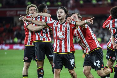 Sheffield United takımından Callum O 'Hare, 12 Mayıs 2025' te Sheffield Lane, İngiltere 'de oynanan ve Bristol City' ye karşı oynanan Gökyüzü İddia Şampiyonası yarı final maçında 3-0 'lık galibiyetini kutluyor.