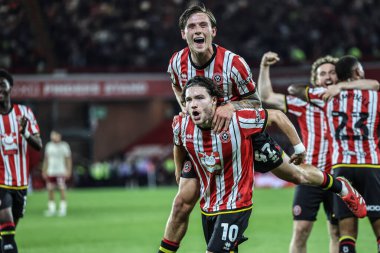 Sheffield United takımından Callum O 'Hare, 12 Mayıs 2025' te Sheffield Lane, İngiltere 'de oynanan ve Bristol City' ye karşı oynanan Gökyüzü İddia Şampiyonası yarı final maçında 3-0 'lık galibiyetini kutluyor.
