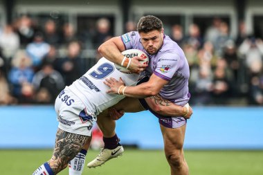Warrington Wolves 'tan Joe Philbin, Wakefield Trinity' den Liam Hood tarafından 18 Mayıs 2025 'te Wakefield, İngiltere' deki DIY Kitchens Stadyumu 'nda oynanan 11.
