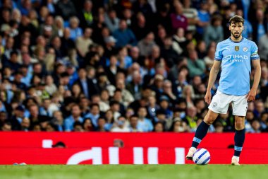 Manchester City 'den Ruben Dias, 20 Mayıs 2025' te Etihad Stadyumu 'nda Manchester City ile Bournemouth arasındaki Premier League maçında topla koşuyor.