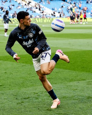 Manchester City 'den Phil Foden, 20 Mayıs 2025' te Etihad Stadyumu 'nda oynanan Premier League maçından önce ısınıyor.
