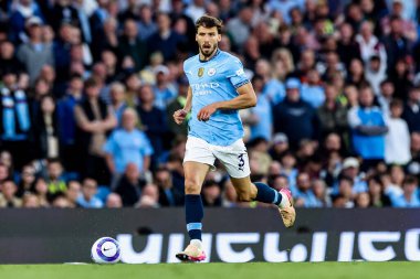 Manchester City 'den Ruben Dias, 20 Mayıs 2025' te Etihad Stadyumu 'nda Manchester City ile Bournemouth arasındaki Premier League maçında topla koşuyor.
