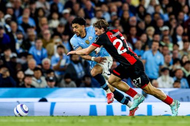 Manchester City 'den Omar Marmoush 20 Mayıs 2025 tarihinde Etihad Stadyumu' nda Manchester City ve Bournemouth maçında AFC Bournemouth takımından Illia Zabarnyi ile top mücadelesi veriyor.
