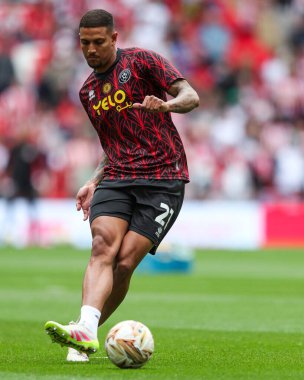 Sheffield United takımından Vinicius Souza, 24 Mayıs 2025 'te İngiltere' nin Wembley Stadyumu 'nda Sheffield United ile Sunderland arasındaki final maçı öncesinde ısınıyor.
