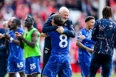 Chelsea Premier Lig maçının ardından Nottingham Forest Chelsea 'ye karşı 25 Mayıs 2025' te İngiltere 'nin Nottingham şehrinde oynanan City Ground maçında kazandığı galibiyet sonrasında Şampiyonlar Ligi' ndeki yerlerini kutluyor.