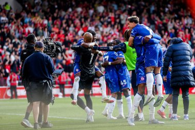 Chelsea Premier Lig maçının ardından Nottingham Forest Chelsea 'ye karşı 25 Mayıs 2025' te İngiltere 'nin Nottingham şehrinde oynanan City Ground maçında kazandığı galibiyet sonrasında Şampiyonlar Ligi' ndeki yerlerini kutluyor.