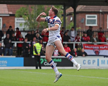 Wakefield Trinity 'den Ellis Lingard, 25 Mayıs 2025' te Birleşik Krallık 'ın Wakefield Stadyumu' nda oynanan Betfred Süper Lig karşılaşmasında ikinci denemesini kutluyor.