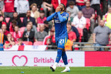 AFC Wimbledon takımından Myles Hippolyte, 26 Mayıs 2025 'te Wembley Stadyumu' nda oynanan Wimbledon-Walsall maçında attığı golü kutluyor.