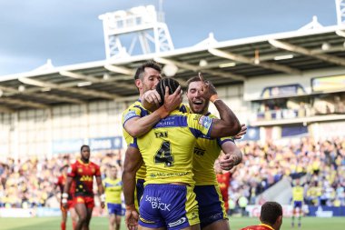Warrington Wolves takımından Rodrick Tai, 30 Mayıs 2025 'te İngiltere' nin Warrington kentinde oynanan 13. Betfred Süper Lig karşılaşmasında Warrington Wolves Castleford Tigers 'a karşı oynadığı maçı kutluyor.
