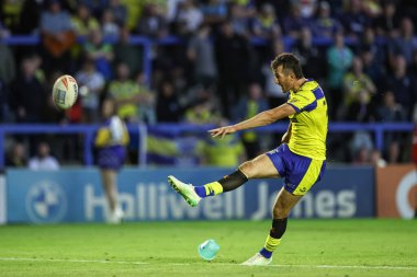 Warrington Wolves 'tan Stefan Ratchford, 30 Mayıs 2025' te İngiltere 'nin Warrington kentinde oynanan 13. Betfred Süper Lig karşılaşmasında gol atmak için Castleford Tigers' a karşı Warrington Wolves maçına çıktı.