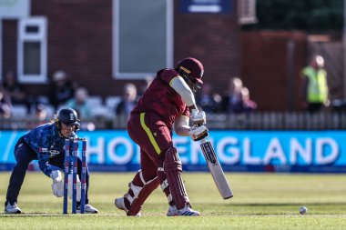 Batı Hint Adaları 'ndan Qiana Joseph, 30 Mayıs 2025' te Derbyshire İlçe Kriket Kulübü 'nde oynanan Uluslararası İngiltere - Batı Hint Adaları Kadınlar - Batı Hint Adaları karşılaşmasında 50 koşu (yarım asır) ile biten bir koşu için topa vuruyor.