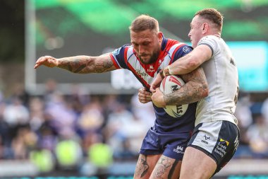 Wakefield Trinity 'den Josh Griffin, Leeds Rhinos' tan Harry Newman tarafından 31 Mayıs 2025 'te Leeds Süper Lig karşılaşmasında Leeds Rhinos' a karşı Wakefield Trinity 'nin rakibi oldu.