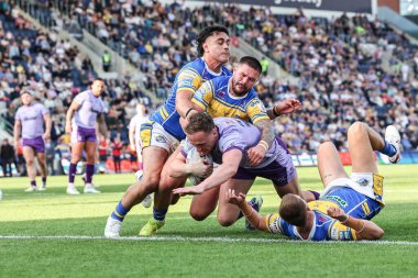 Warrington Wolves takımından Ben Currie, 14 Haziran 2025 'te Headingley Stadyumu' nda oynanan 14. Leeds Gergedanı - Warrington Wolves karşılaşmasında bir deneme için sahaya çıkıyor.