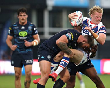 Wigan Warriors takımından Kaide Ellis, 15. Betfred Süper Ligi karşılaşmasında Wakefield Trinity ile Wigan Warriors arasında Wakefield Stadyumu, Wakefield, İngiltere 'de 20 Haziran 2025' de oynanan karşılaşmada Wakefield Trinity 'yi yendi.