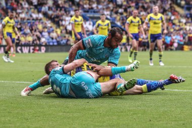 Warrington Wolves 'tan Marc Sneyd, 21 Haziran 2025' te İngiltere 'nin Warrington şehrinde oynanan 15. Betfred Süper Lig karşılaşmasında Warrington Wolves, Huddersfield Giants' a karşı oynuyor.