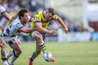 Warrington Wolves takımından George Williams, 28 Haziran 2025 'te Warrington Jones Stadyumu' nda oynanan 16. Warrington Wolves vs Hull FC karşılaşmasında maç sırasında hareket halindeydi.