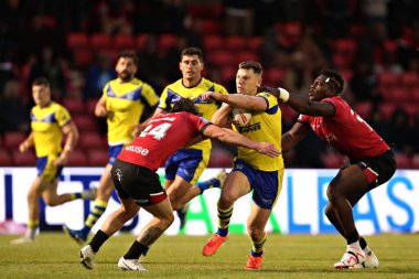 Salford Red Devils 'ten Harvey Wilson ve Salford Red Devils' den Justin Sangare, Warrington Wolves 'tan George Williams ile oynadıkları Betfred Süper Ligi' nin 17. turunda Salford Red Devils ve Warrington Wolves, Salford Community Stadyumu 'nda karşılaştılar. 