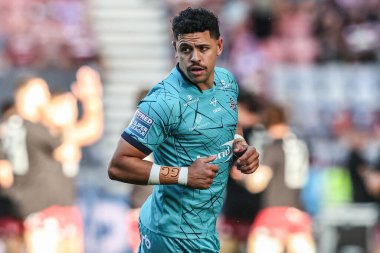 Huddersfield Giants takımından Jacob Gagai, Betfred Süper Lig ön eleme maçında Wigan Warriors 'a karşı Huddersfield Giants maçı sırasında 11 Temmuz 2025' de Wigan, Wigan 'daki Brick Community Stadyumu' nda ısındı.