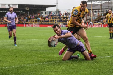 Warrington Wolves takımından Stefan Ratchford, 20 Temmuz 2025 'te İngiltere' nin Castleford kentinde oynanan 19. Betfred Süper Ligi karşılaşmasında Castleford Tigers ile Warrington Wolves maçına çıkıyor.
