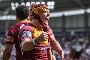 Huddersfield Giants takımından George Flanagan, 26 Temmuz 2025 'te MKM Stadyumu' nda oynanan 20. Betfred Süper Lig karşılaşmasında Hull FC ve Huddersfield Giants karşılaşmasını kutluyor.
