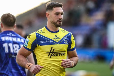 Warrington Wolves takımından Ryan Matterson, Betfred Süper Lig karşılaşmasında ısınma turunda 21. Warrington Wolves Wigan Warriors 'a karşı Halliwell Jones Stadyumu, Warrington, İngiltere, 8 Ağustos 2025