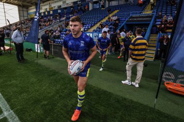 Warrington Wolves takımından George Williams, 8 Ağustos 2025 'te Warrington, İngiltere' deki Halliwell Jones Stadyumu 'nda oynanan 21. Warrington Wolves vs Wigan Warriors maçında ısınma turuna çıkıyor.