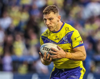 Warrington Wolves 'tan George Williams, 14 Ağustos 2025' te İngiltere 'nin Warrington şehrinde oynanan 22. Betfred Süper Lig karşılaşmasında Warrington Wolves, Catalans Dragons' a karşı oynuyor.