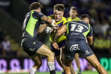 Warrington Wolves takımından Luke Thomas, 14 Ağustos 2025 'te Warrington, İngiltere' deki Halliwell Jones Stadyumu 'nda oynanan 22.