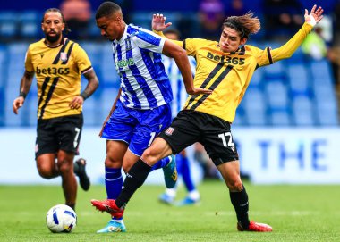 Sheffield 'den Yan Valery Çarşamba ve Stoke City' den Tatsuki Seko, Çarşamba günü Sheffield Çarşamba günü İngiltere 'nin Sheffield kentinde Stoke City' ye karşı oynanan Gökyüzü İddia Şampiyonası maçında top mücadelesi veriyor.