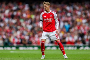 Arsenal 'den Martin Odegaard, 23 Ağustos 2025' te Birleşik Krallık 'taki Emirates Stadyumu' nda oynanan Premier League karşılaşmasında Leeds United 'a karşı mücadele etti.
