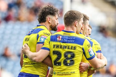 Warrington Wolves 'tan Toby King, 24 Ağustos 2025' te İngiltere 'nin Huddersfield Stadyumu' nda oynanan Betfred Süper Lig 23. Maçı 'nda Huddersfield Giants ve Warrington Wolves maçını kutluyor.