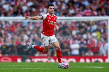 Arsenal 'den Declan Rice, 23 Ağustos 2025' te Birleşik Krallık 'taki Emirates Stadyumu' nda oynanan Premier League maçında topla koşuyor.