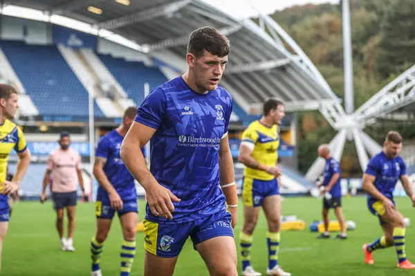 Warrington Wolves takımından Josh Thewlis, Betfred Süper Lig 23. Raundda oynanan Huddersfield Giants 'ın Warrington Wolves' a karşı oynadığı maçta maç öncesi ısınma turunda, 24 Ağustos 2025 'te Accu Stadyumu, Huddersfield, Birleşik Krallık