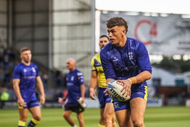 Warrington Wolves 'tan Tom McKinney maç öncesi ısınma turunda 24. Betfred Süper Ligi karşılaşmasında Warrington Wolves, Salford Red Devils' e karşı Halliwell Jones Stadyumu, Warrington, Birleşik Krallık, 29 Ağustos 2025