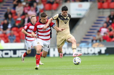 Rotherham United takımından Joe Powell 30 Ağustos 2025 'te Doncaster Rotherham United maçında Eco-Power Stadyumu' nda Doncaster Rotherham United 'a karşı oynadı.