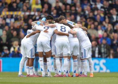 Leeds team huddle during the Premier League match Leeds United vs Bournemouth at Elland Road, Leeds, United Kingdom, 27th September 2025