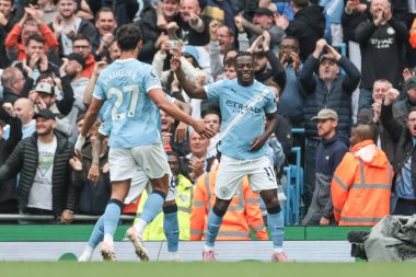 Manchester City 'den Jeremy Doku, 27 Eylül 2025' te Etihad Stadyumu 'nda oynanan Premier League maçında Manchester City-Burnley maçında 1-0' lık galibiyetini kutluyor. 